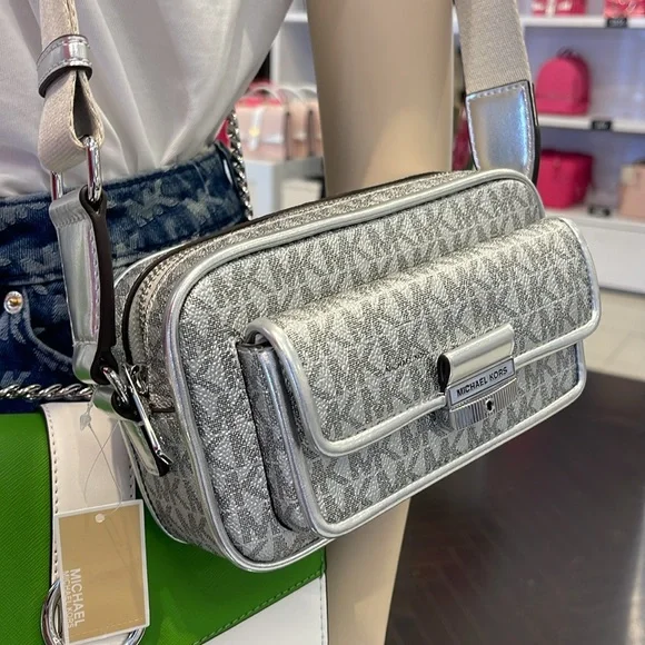 Michael Kors Bradshaw Extra-Sm Metallic Signature Logo Camera Crossbody
Silver - Picture 12 of 16